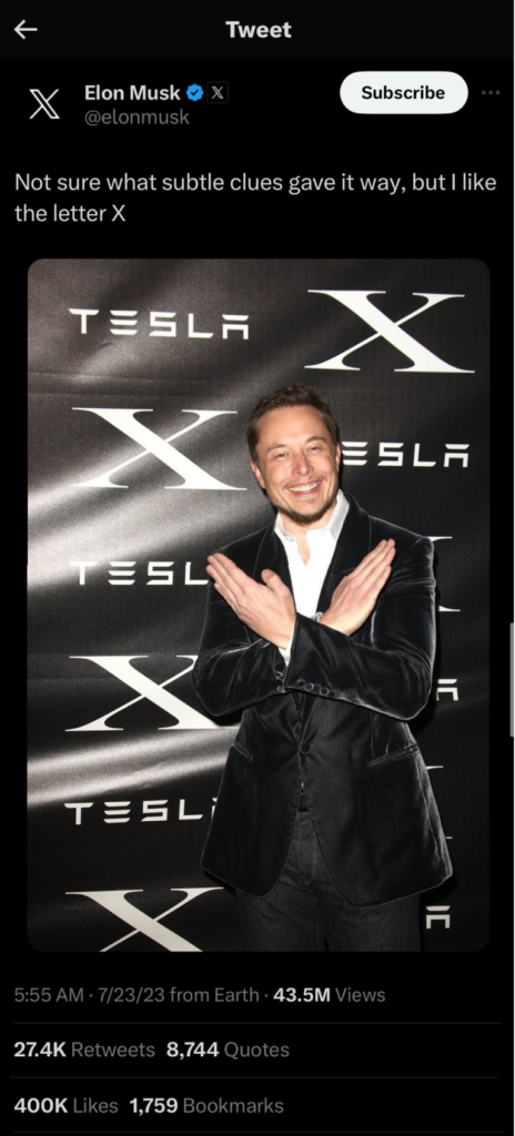 A picture of Twitter's current owner, with his arms forming an X representing the "love" he has for the letter.