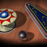 An image of a pinball bumper, flipper and ball from the old Space Cadet Pinball Game