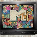 An old TV, showing the MTV Logo along with some colorful doodles that look very 90's as a representation of the impact of MTV on pop culture. The TV has an old brick wall behind it.