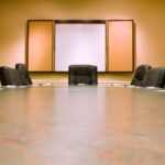 A meeting room. Plain, boring and empty. A representation on how Being Too Corporate on Social Media Might Be Killing Your Brand